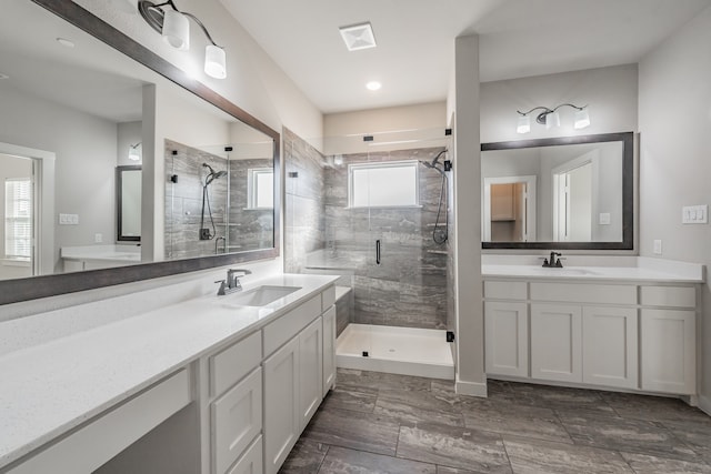 bathroom with vanity and an enclosed shower