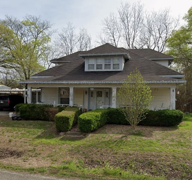 view of front of property featuring covered porch