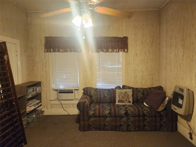 carpeted living room featuring cooling unit, heating unit, and ceiling fan