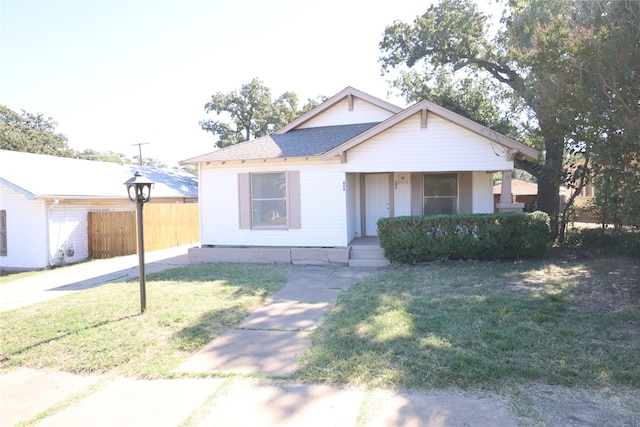 view of front of house with a front lawn