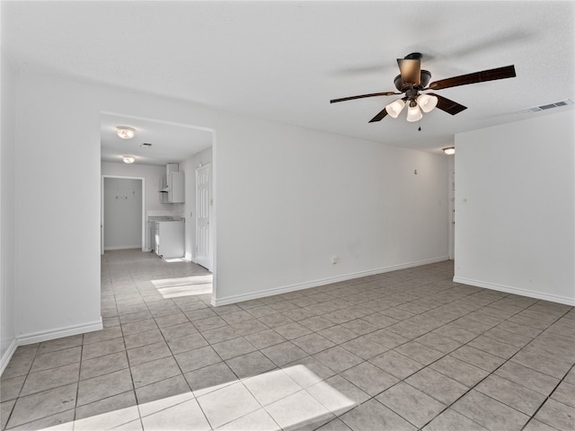 unfurnished room featuring ceiling fan and dark wood-type flooring