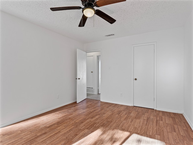 unfurnished bedroom featuring light wood-type flooring