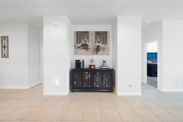 1020 Nicole Way, Fort Worth, TX 76028 - kitchen with white cabinets, stainless steel appliances, a center island with sink, open floor plan, and light tile patterned floors