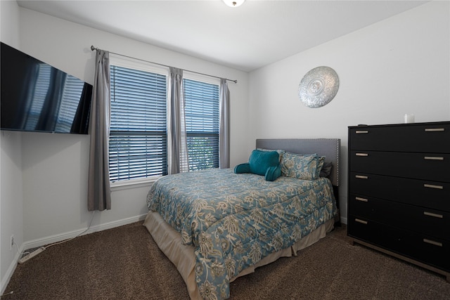 1020 Nicole Way, Fort Worth, TX 76028 - carpeted bedroom featuring multiple windows, lofted ceiling, and baseboards
