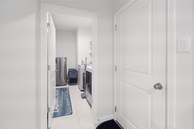 1020 Nicole Way, Fort Worth, TX 76028 - laundry room with light tile patterned floors and laundry area