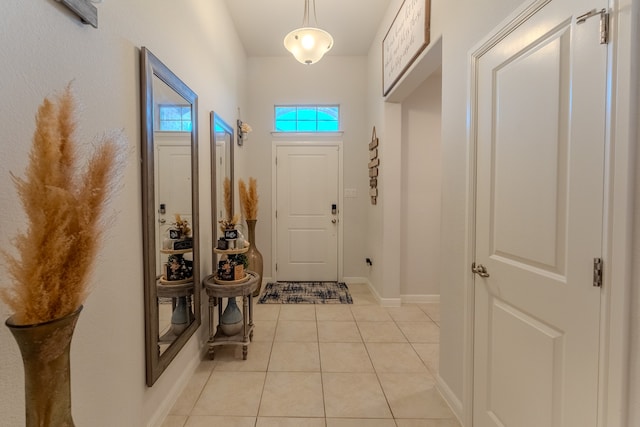 entrance foyer featuring light tile patterned flooring