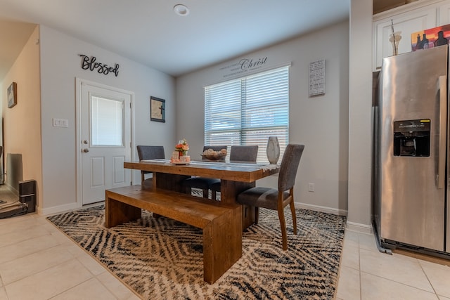 view of tiled dining space