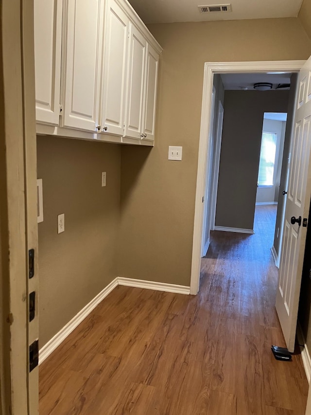 washroom with light wood-type flooring