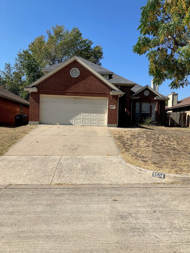 single story home with a garage