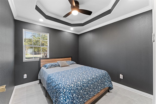 bedroom with crown molding, a raised ceiling, tile patterned flooring, and ceiling fan