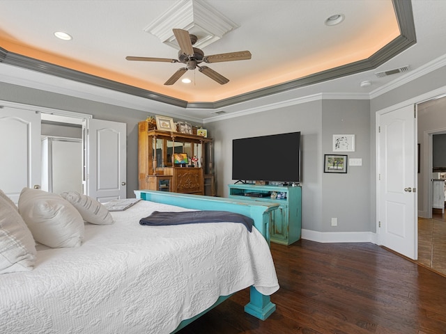 bedroom featuring a raised ceiling, ceiling fan, crown molding, and dark hardwood / wood-style floors