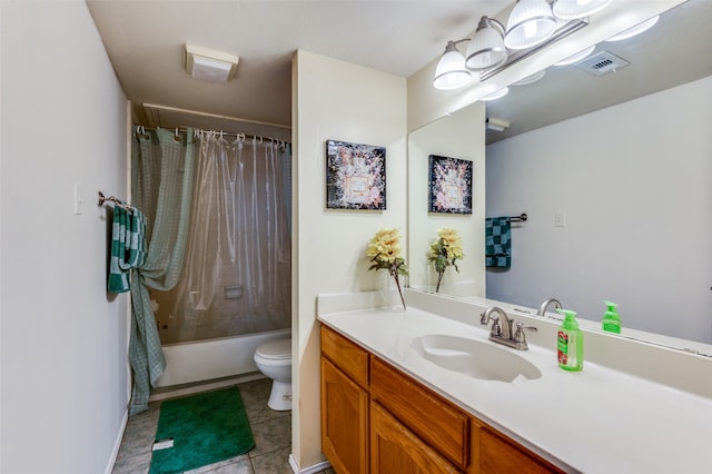 full bathroom with tile patterned floors, vanity, shower / tub combo, and toilet