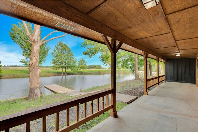 view of patio featuring a water view