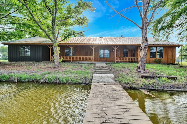 exterior space featuring a water view