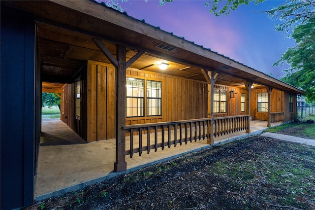 view of property exterior at dusk