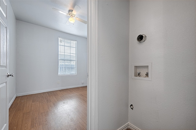 washroom with light hardwood / wood-style flooring, hookup for a washing machine, and ceiling fan