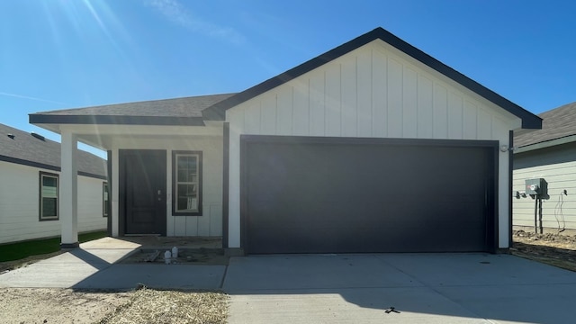 ranch-style home featuring a garage