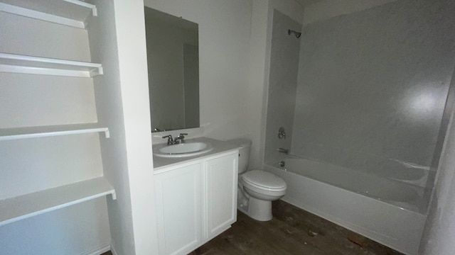 full bathroom featuring wood-type flooring, vanity, toilet, and shower / bathtub combination