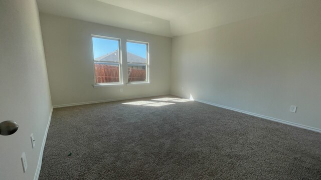 spare room featuring carpet flooring