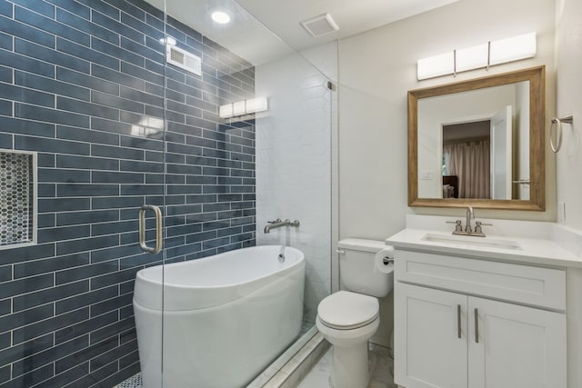 full bathroom featuring vanity, toilet, tile walls, and plus walk in shower