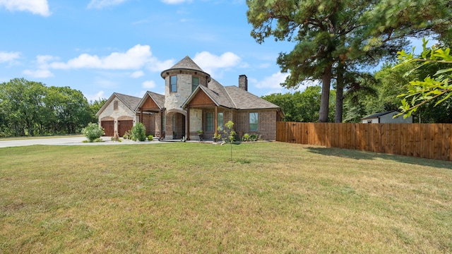 view of front facade with a front lawn