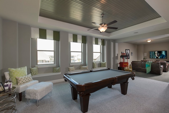 game room with pool table, carpet flooring, a tray ceiling, and ceiling fan