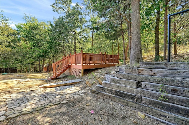 view of yard featuring a wooden deck