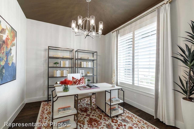 office space featuring a textured ceiling, a chandelier, plenty of natural light, and dark hardwood / wood-style flooring