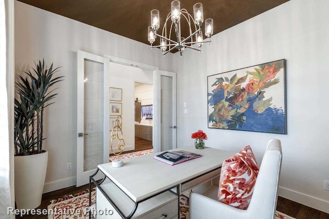 dining space with french doors, an inviting chandelier, and dark hardwood / wood-style floors