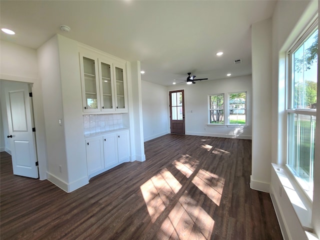 interior space featuring dark hardwood / wood-style floors and ceiling fan