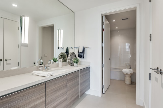 bathroom with vanity and tile patterned floors