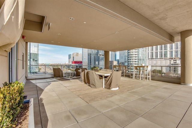 view of patio / terrace with a balcony