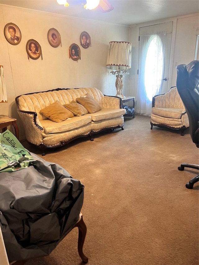 carpeted living room featuring ceiling fan