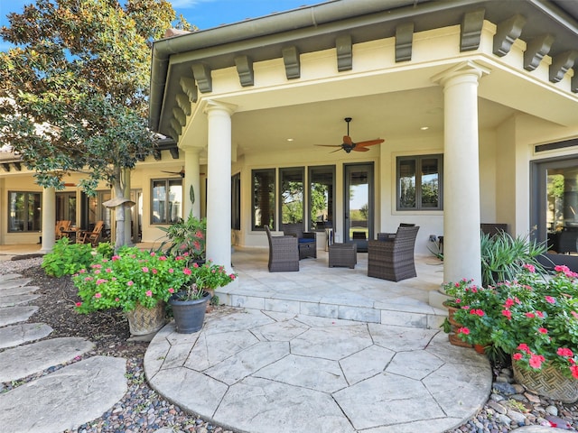 view of patio / terrace featuring ceiling fan