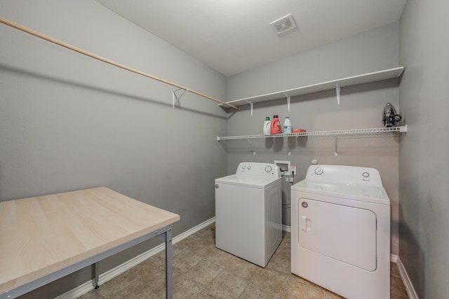 laundry area featuring independent washer and dryer