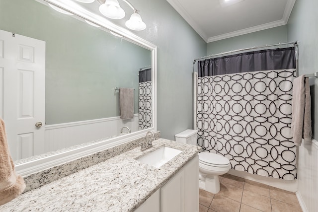 bathroom featuring toilet, vanity, crown molding, curtained shower, and tile patterned flooring