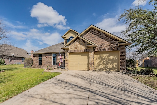 view of front of house featuring a front yard and a garage