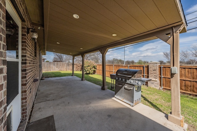 view of patio with a grill