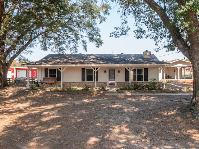 ranch-style house featuring a porch