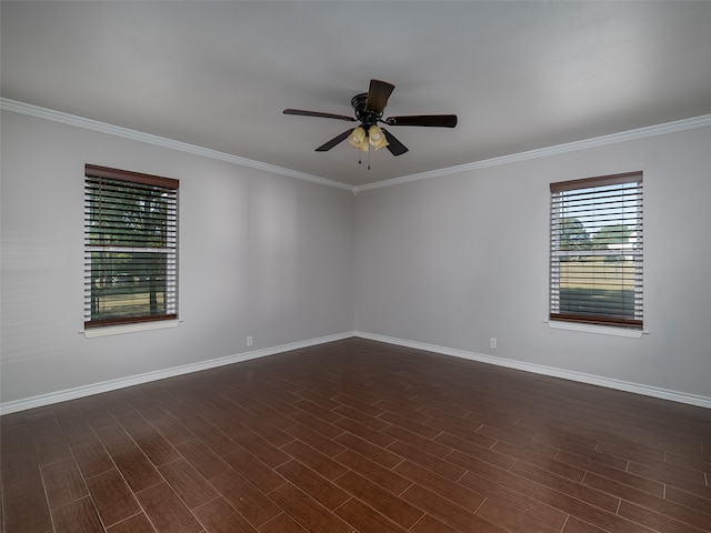 spare room with crown molding, ceiling fan, and dark hardwood / wood-style flooring