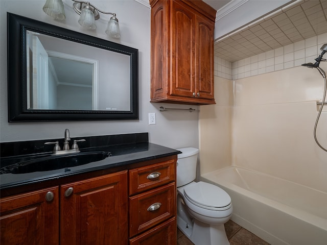 full bathroom featuring toilet, vanity, crown molding, tile patterned floors, and shower / bath combination