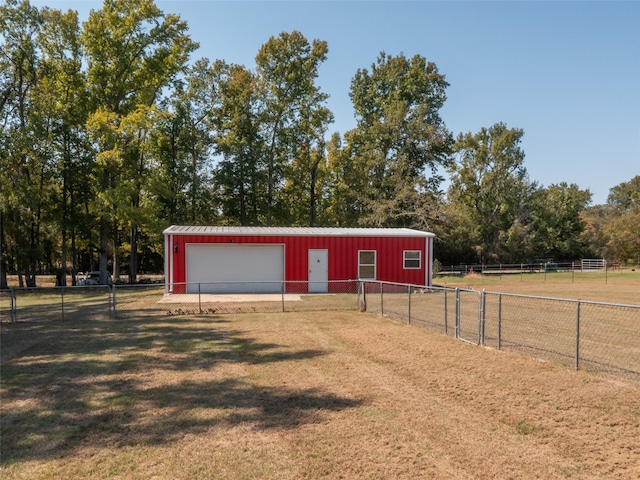 view of stable featuring a rural view