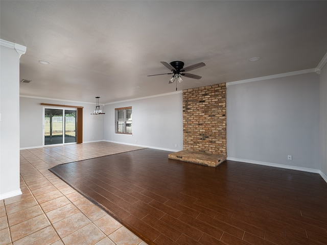 unfurnished living room with light hardwood / wood-style floors, crown molding, and ceiling fan