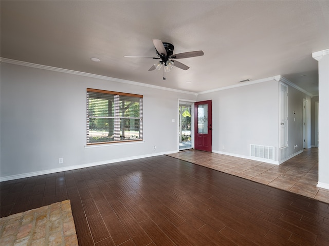 spare room with ceiling fan, crown molding, and wood-type flooring