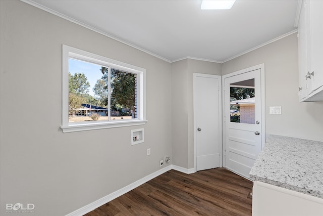 interior space with ornamental molding and dark hardwood / wood-style flooring