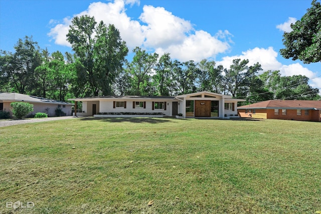 single story home featuring a front yard