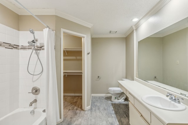 full bathroom with shower / bath combo, hardwood / wood-style floors, toilet, vanity, and ornamental molding