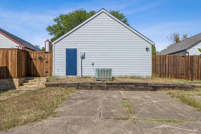 view of outdoor structure featuring central AC