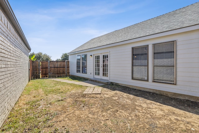 view of yard featuring french doors