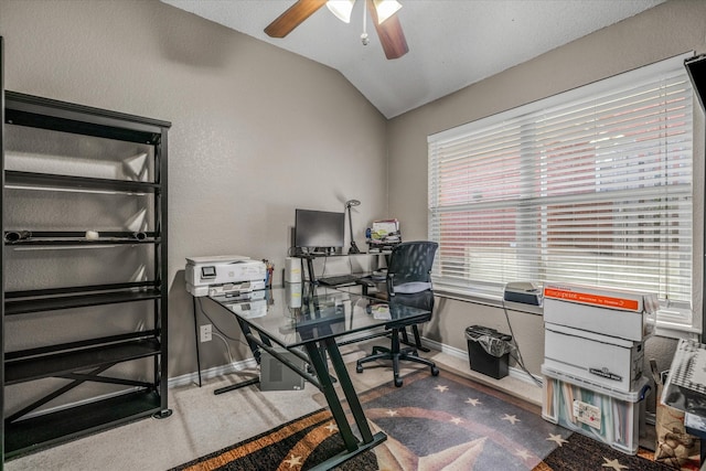 office area featuring ceiling fan and lofted ceiling